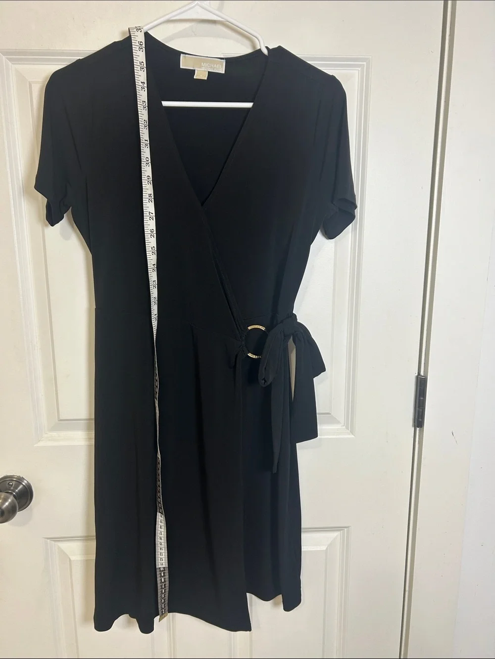 Michael Kors women’s short sleeve wrapped dress size small black with gold ring